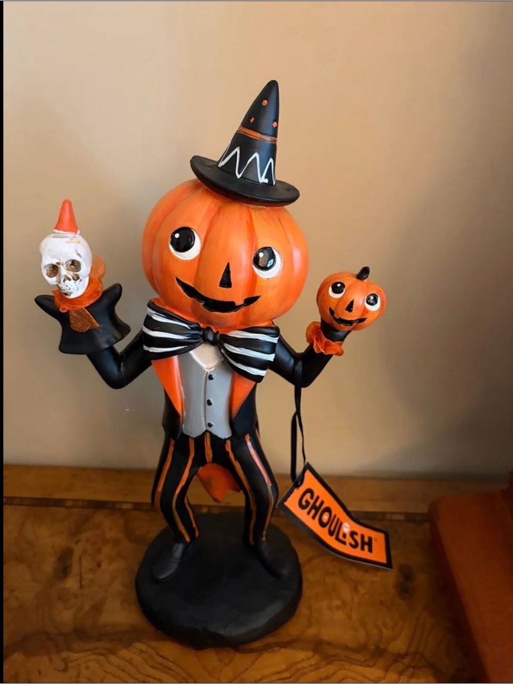 Halloween Ghoulish Vintage-looking Dapper Pumpkin Man Jester holding skull